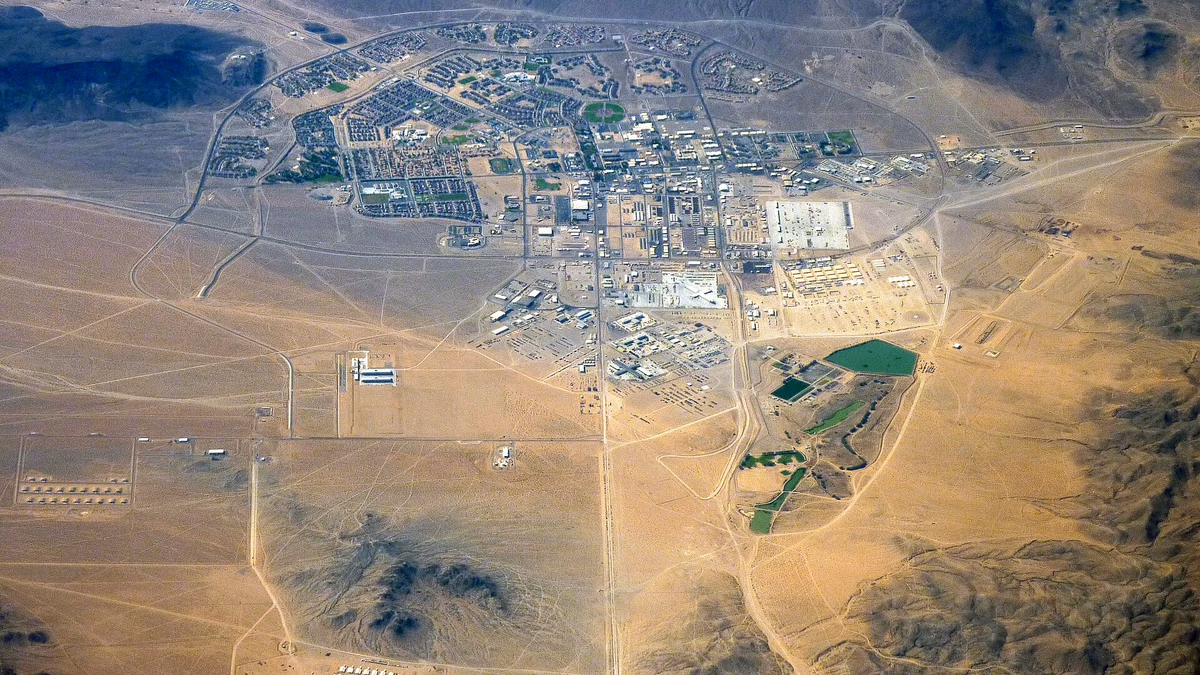 Aerial view of the Fort Irwin Military Reservation central base area in the Mojave Desert , located in San Bernardino County, California .