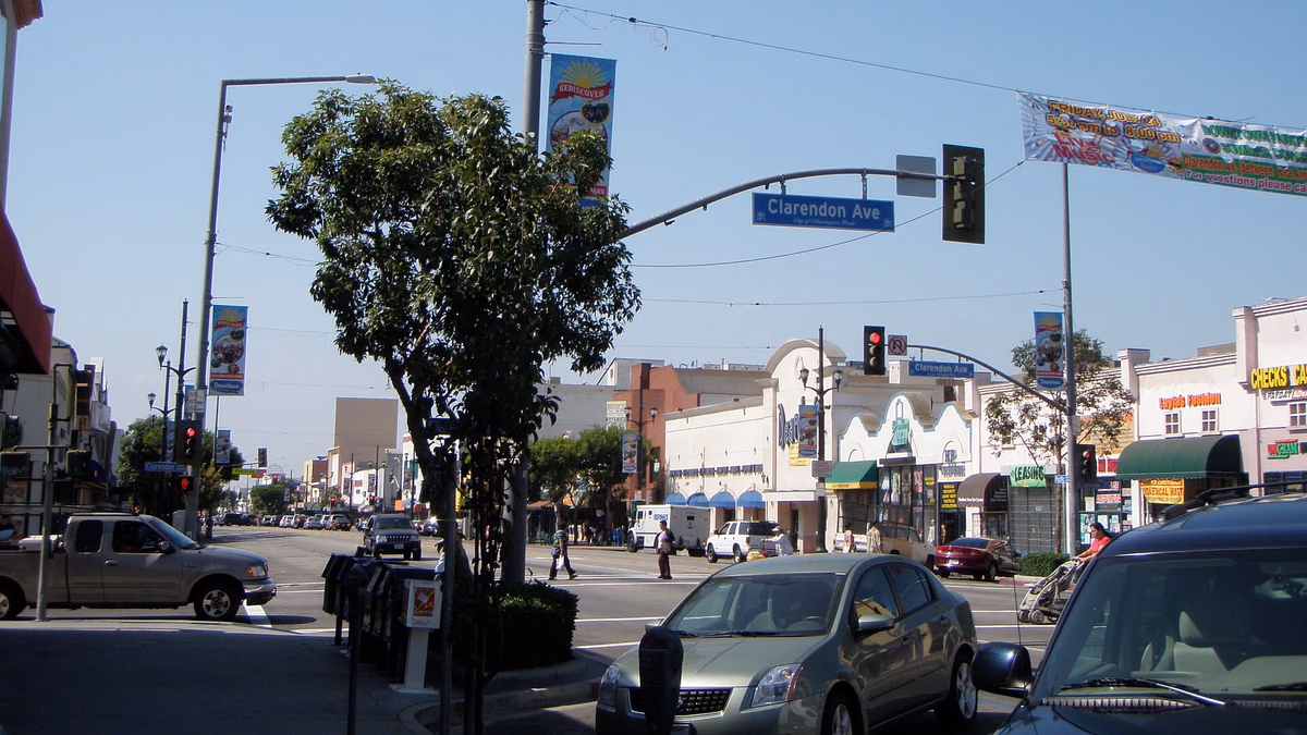 This is a photograph of the intersection of Pacific Boulevard and Clarendon Avenue in Huntington Park, California on a Saturday morning in August of 2009.