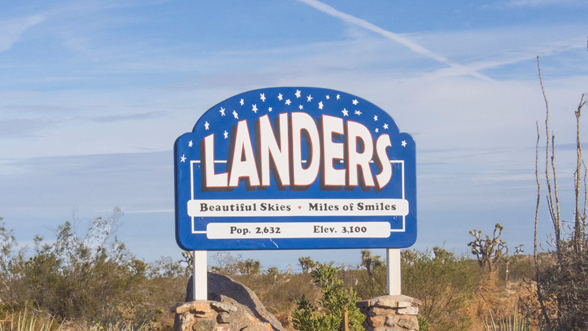 Landers community sign outside U.S. Post Office in Landers, California USA