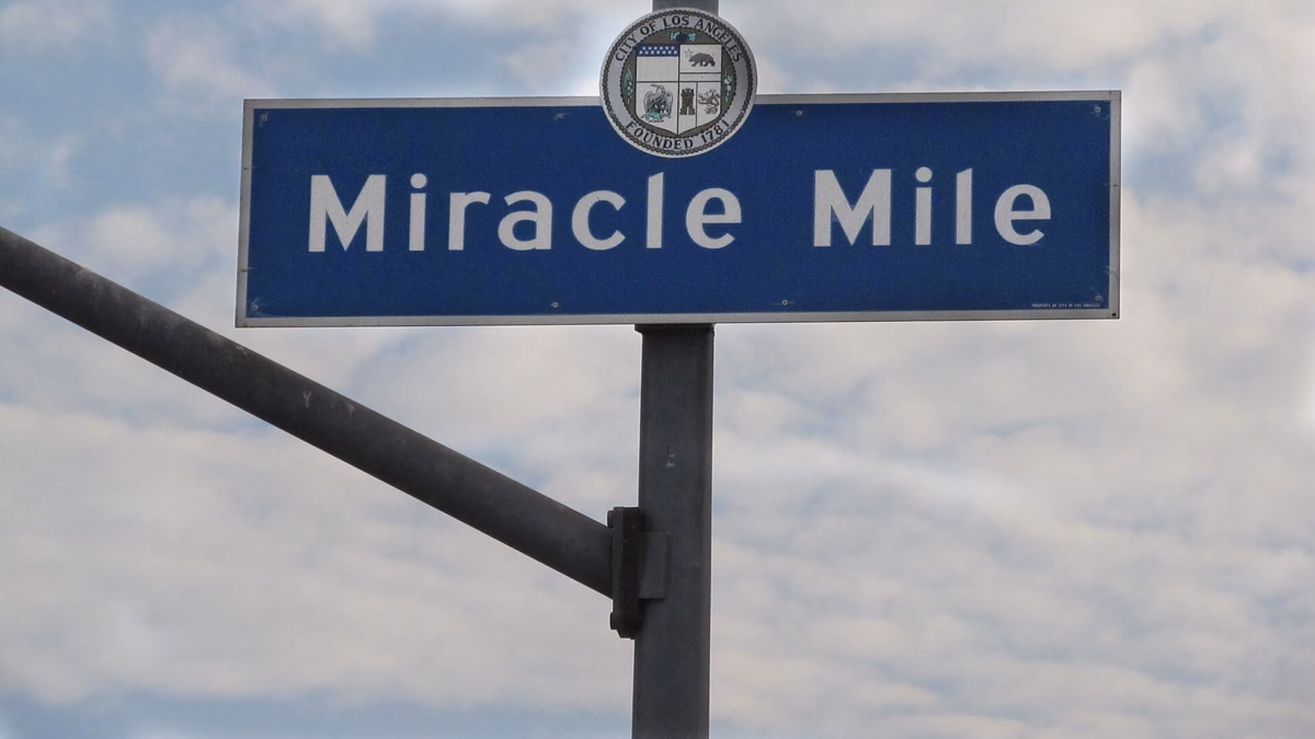 Miracle Mile Signage located at the intersection of San Vicente Boulevard and Hauser Street.