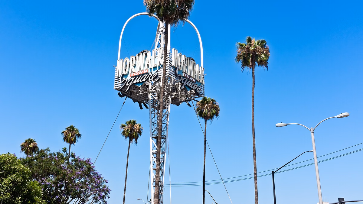 Old Norwalk Town Square Shopping Center sign in Norwalk, California at the intersection of Pioneer and Rosecrans