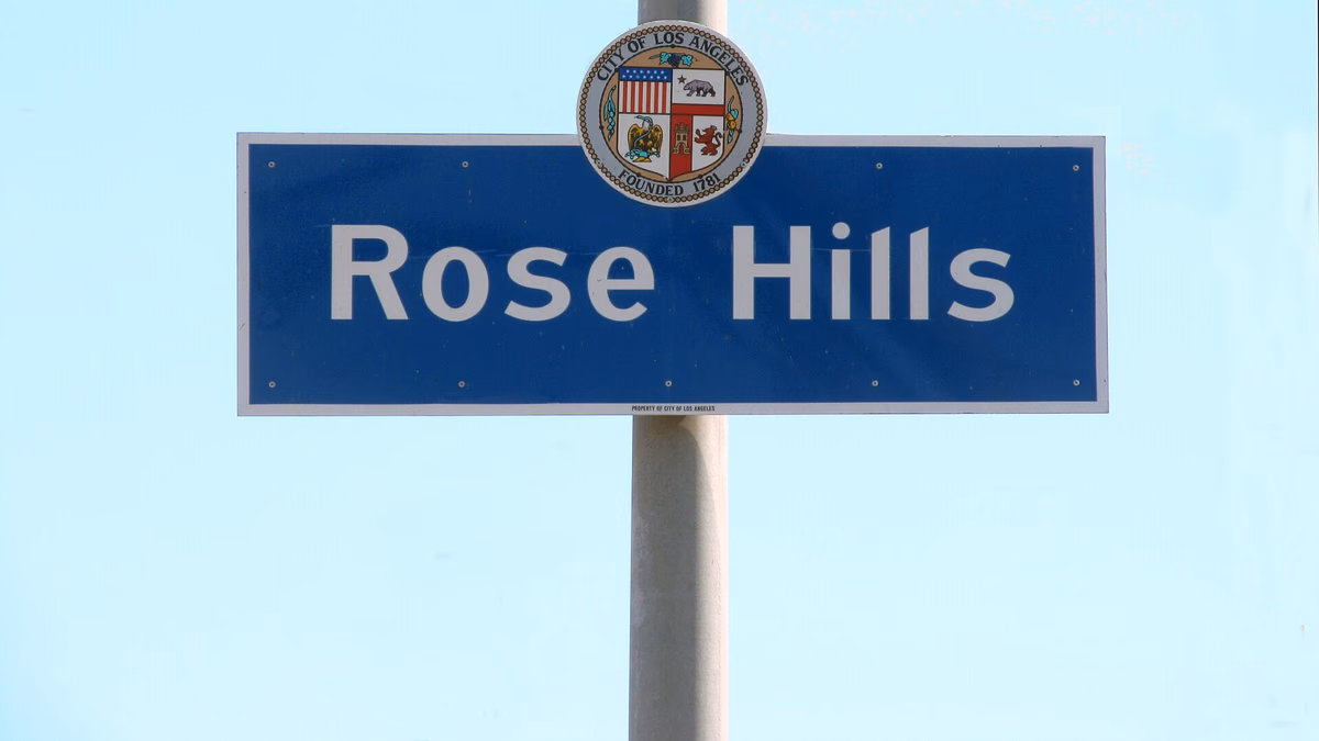 Rose Hills Neighborhood Sign located on Huntington Drive at Collis Avenue in Los Angeles