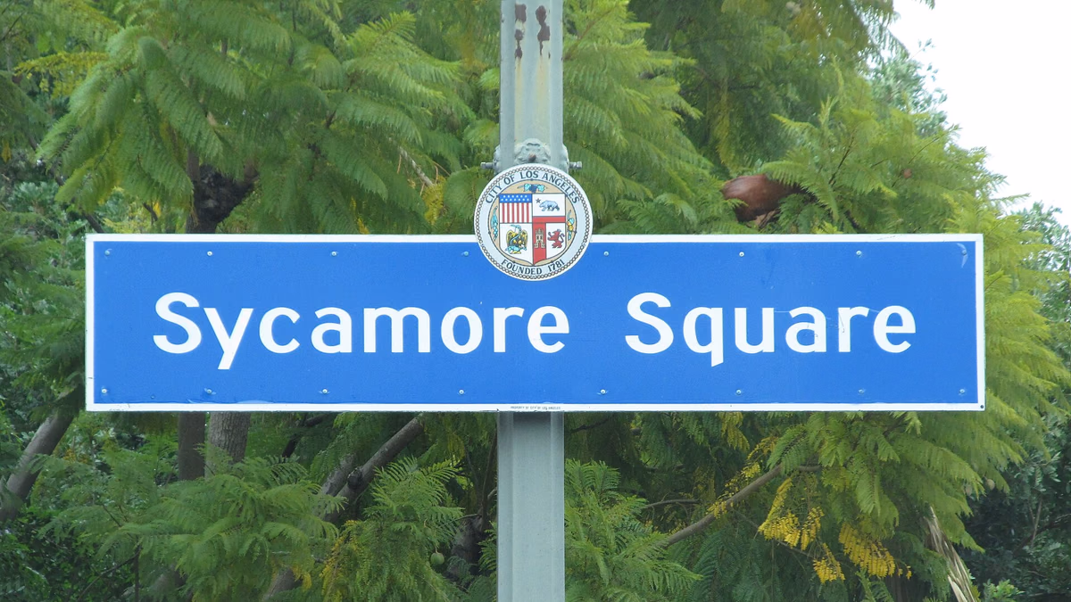 Sycamore Square Neighborhood Sign located on Olympic Boulevard and Citrus Avenue