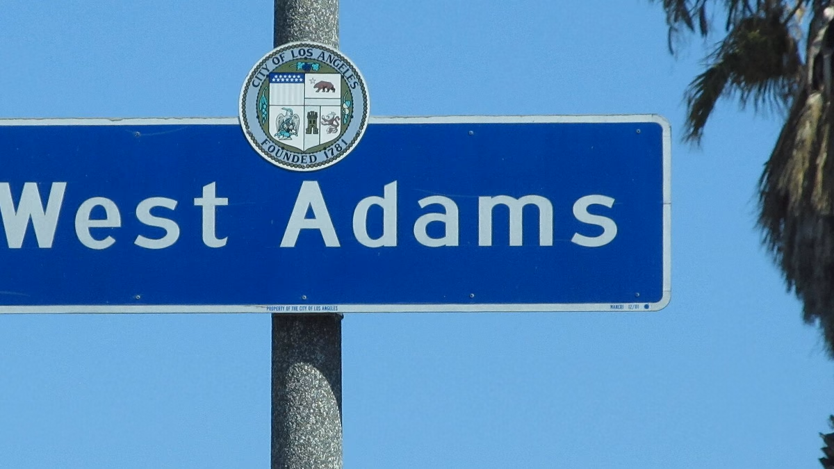 West Adams Neighborhood Signage located at the intersection of Western Avenue and 22nd Street in Los Angeles.