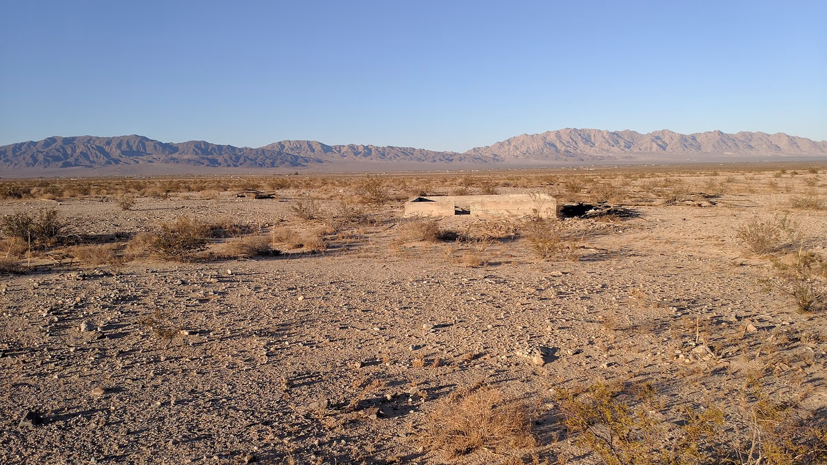 Foundation of a derelict recreational cabin in Wonder Valley, California