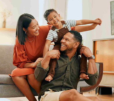 A family laughing together at home