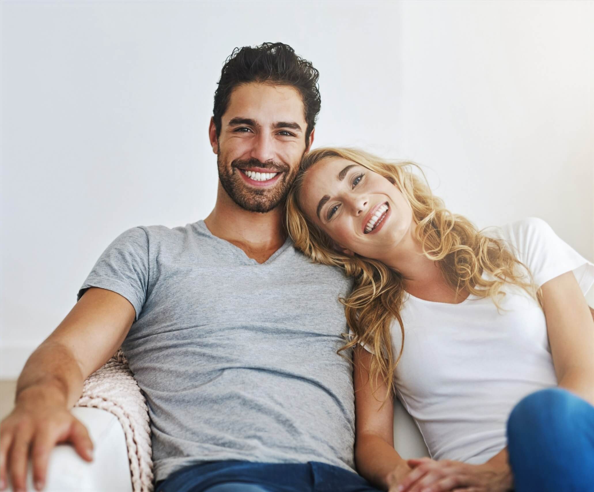 A smiling couple sitting together