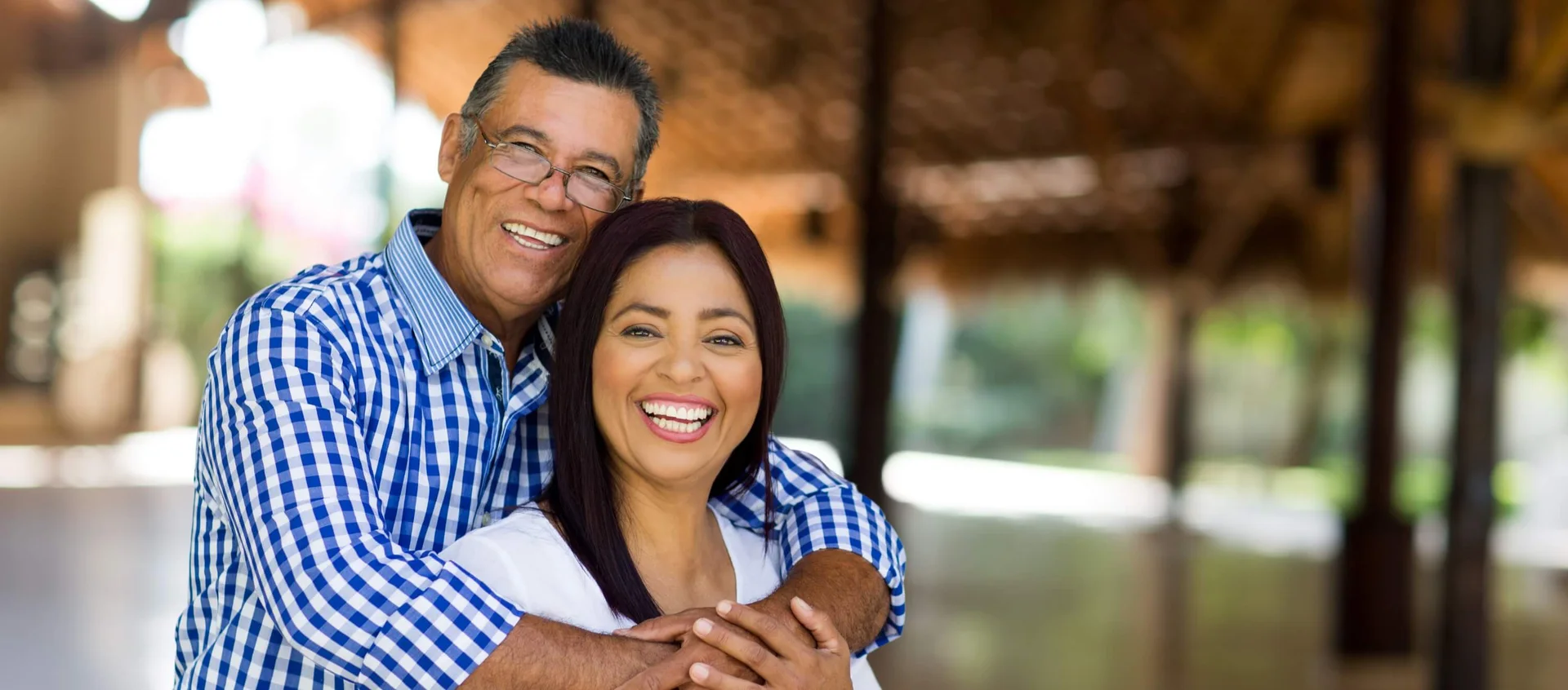 A smiling couple embracing