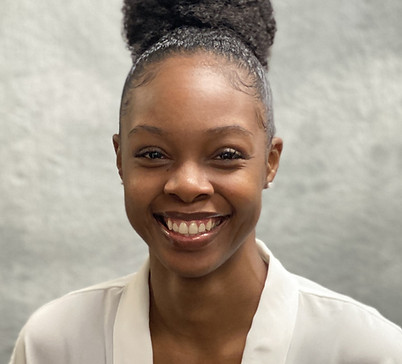 Ty'Jalayah Robertson smiling in a professional headshot.